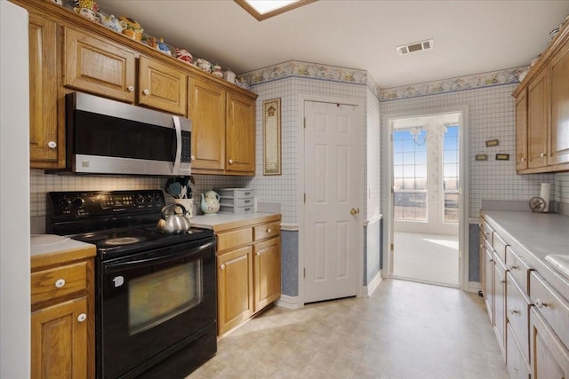 kitchen with black / electric stove