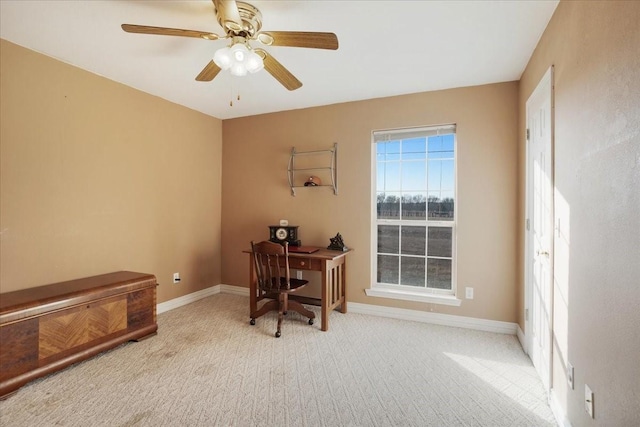 office featuring ceiling fan and light colored carpet