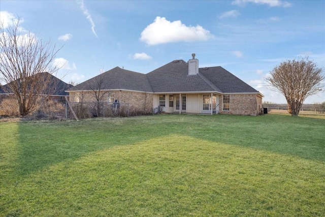 view of front of home with a front lawn