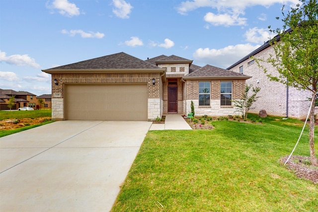5208 Greenbrook Rd, Denton, TX 76226 - view of front of property featuring an attached garage, driveway, a front lawn, and stone siding
