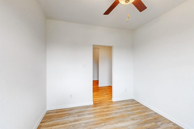 5208 Greenbrook Rd, Denton, TX 76226 - unfurnished room with light wood-type flooring, a ceiling fan, and baseboards