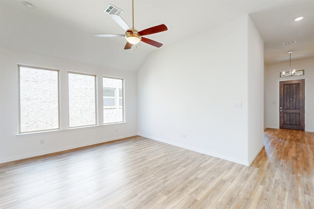 5208 Greenbrook Rd, Denton, TX 76226 - unfurnished room with ceiling fan, light wood-style flooring, a chandelier, vaulted ceiling, and baseboards