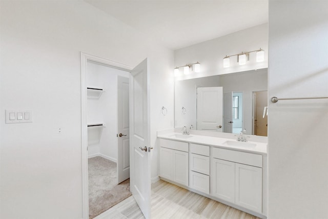 5208 Greenbrook Rd, Denton, TX 76226 - full bathroom with double vanity and a walk in closet
