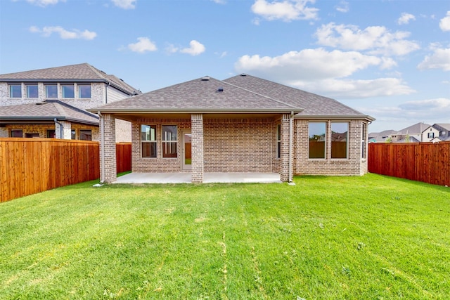 5208 Greenbrook Rd, Denton, TX 76226 - rear view of house with brick siding, a patio area, and roof with shingles