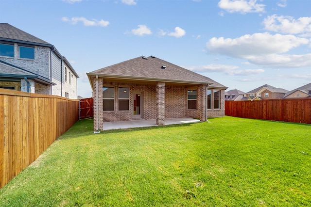 5208 Greenbrook Rd, Denton, TX 76226 - rear view of house featuring brick siding, a patio area, and a shingled roof