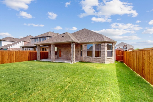 5208 Greenbrook Rd, Denton, TX 76226 - back of property with brick siding, a patio area, and a shingled roof