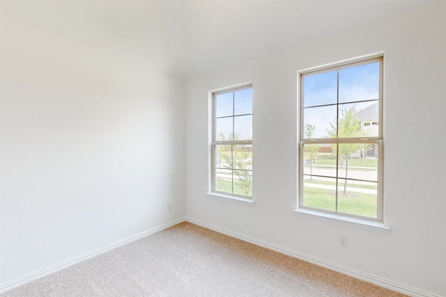 5208 Greenbrook Rd, Denton, TX 76226 - empty room featuring light carpet and baseboards