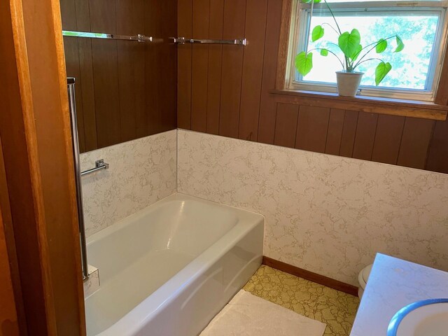 bathroom with sink and a bathtub