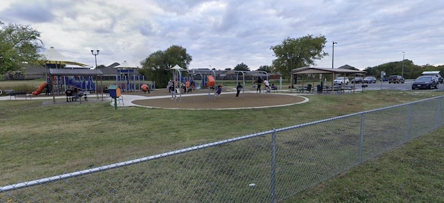 view of playground featuring a gazebo and a lawn