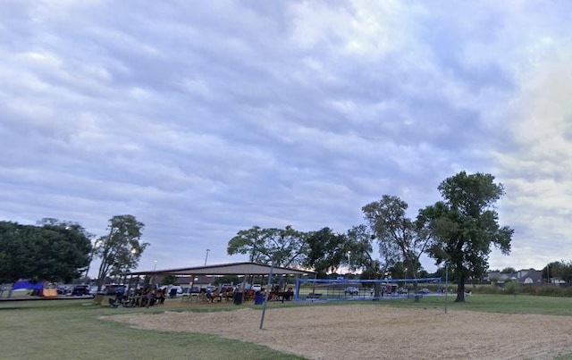 surrounding community featuring volleyball court