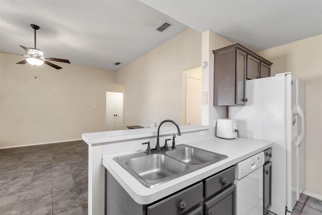 kitchen with sink, dishwasher, dark brown cabinets, a textured ceiling, and kitchen peninsula