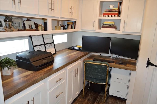 office space with dark hardwood / wood-style flooring