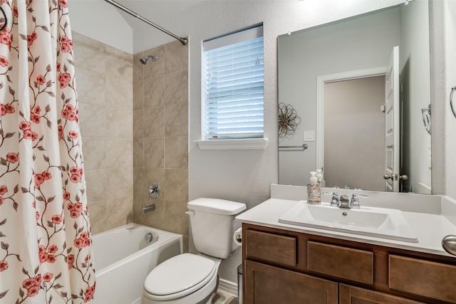 full bathroom featuring vanity, shower / bath combination with curtain, and toilet