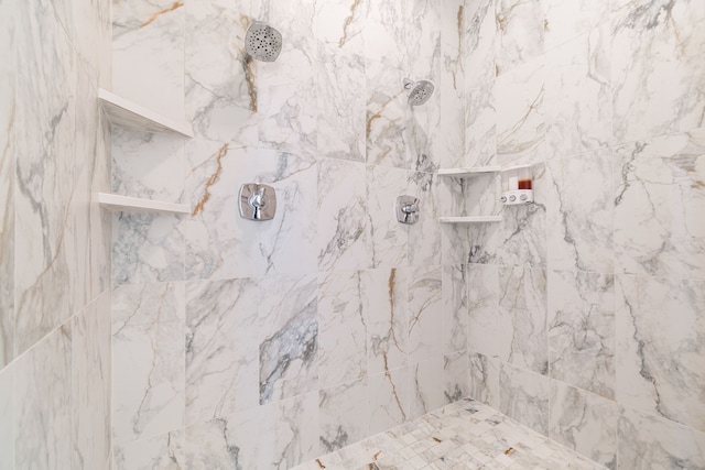 details featuring tiled shower