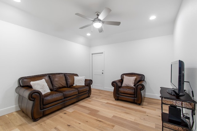 living area with ceiling fan, baseboards, light wood-style floors, and recessed lighting