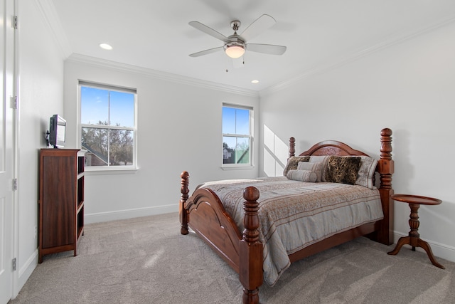 carpeted bedroom featuring a ceiling fan, baseboards, recessed lighting, and ornamental molding