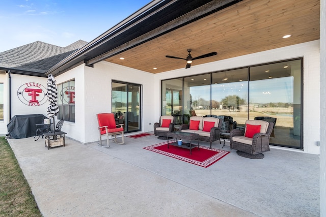 view of patio / terrace featuring ceiling fan and an outdoor living space