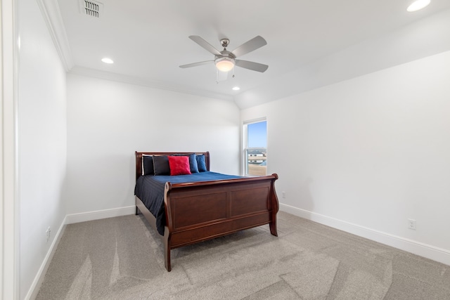 carpeted bedroom with baseboards, visible vents, recessed lighting, and crown molding