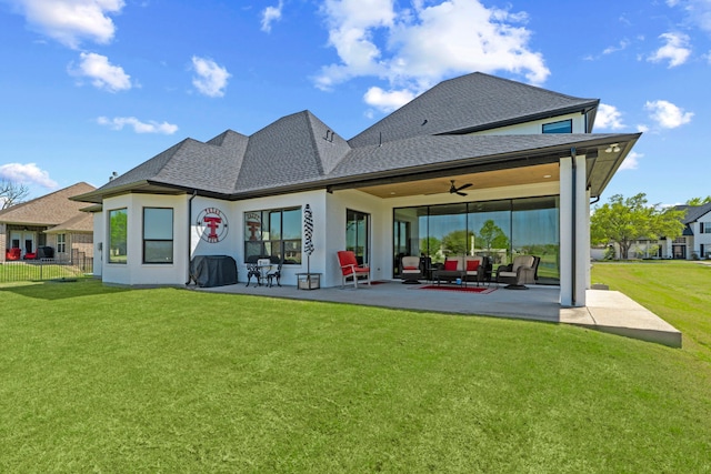 back of house featuring fence, a yard, ceiling fan, a patio, and roof with shingles
