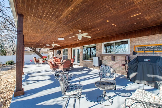 view of patio / terrace with ceiling fan and grilling area