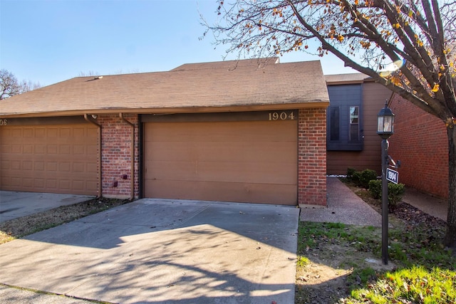 garage with driveway