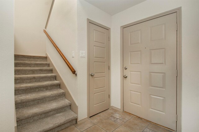 unfurnished room with ceiling fan, lofted ceiling, and dark hardwood / wood-style flooring