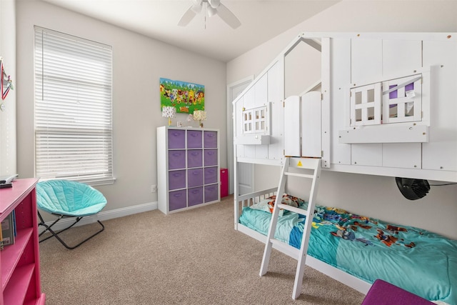 bedroom with ceiling fan and light colored carpet