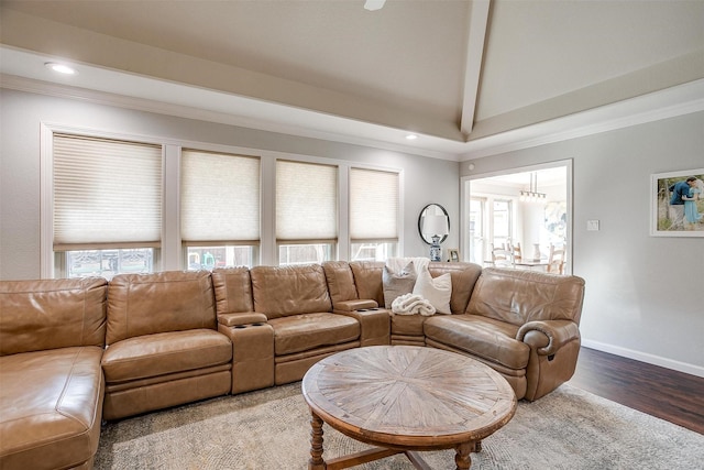 living room featuring hardwood / wood-style flooring, crown molding, and vaulted ceiling with beams