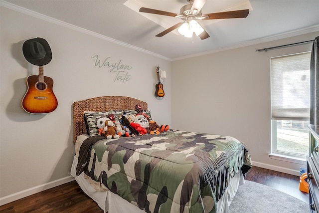 bedroom featuring dark wood-type flooring, ornamental molding, and ceiling fan