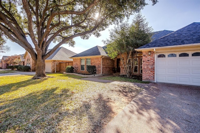 ranch-style home with a front yard