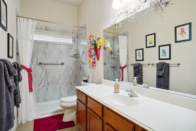 bathroom featuring vanity, tile patterned flooring, curtained shower, and toilet