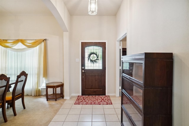 foyer entrance featuring light tile patterned floors