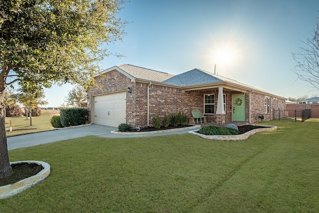 ranch-style house with a garage, a front yard, concrete driveway, and brick siding