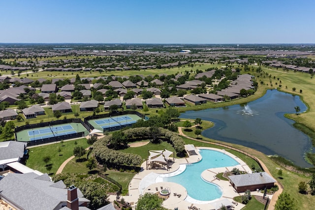 birds eye view of property featuring a water view and a residential view