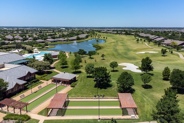 drone / aerial view featuring a water view and golf course view