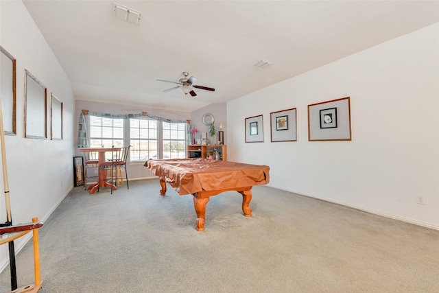 rec room with pool table, light colored carpet, and ceiling fan