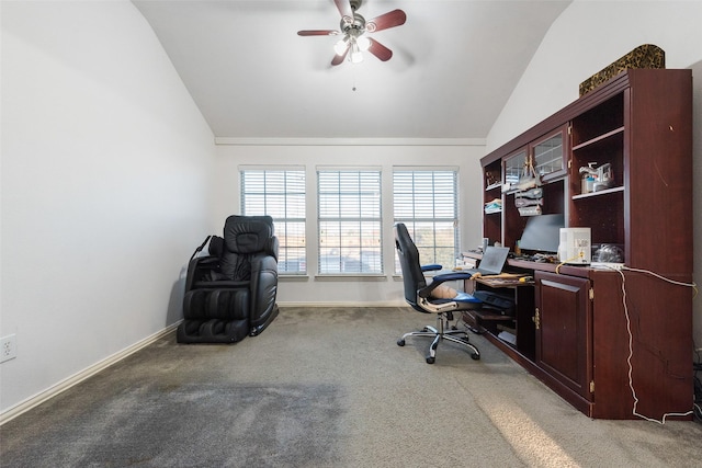 carpeted home office with ceiling fan and lofted ceiling