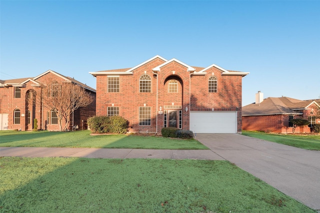 view of front of house with a garage and a front yard