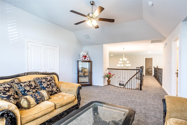 carpeted living room with lofted ceiling and ceiling fan with notable chandelier