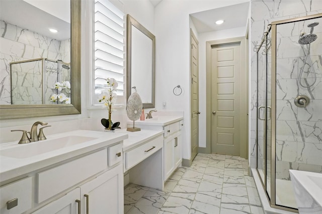 bathroom with vanity and walk in shower