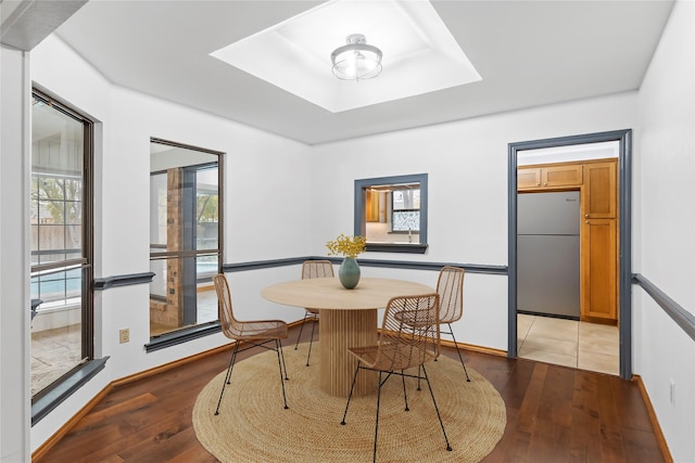 dining area featuring hardwood / wood-style floors