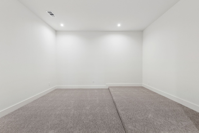 spare room with carpet floors