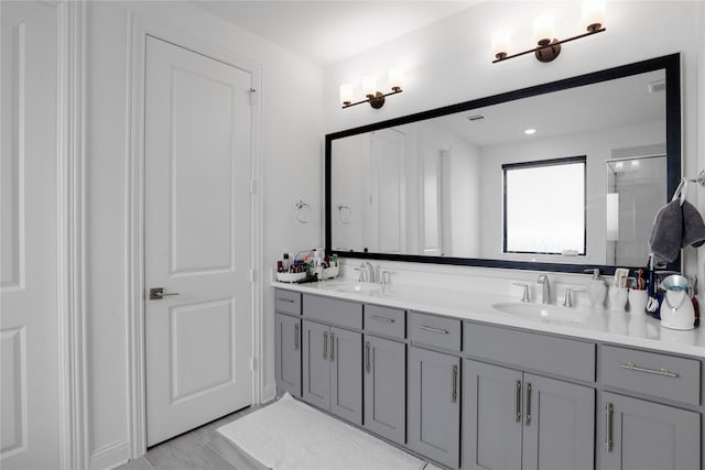 bathroom featuring vanity and walk in shower