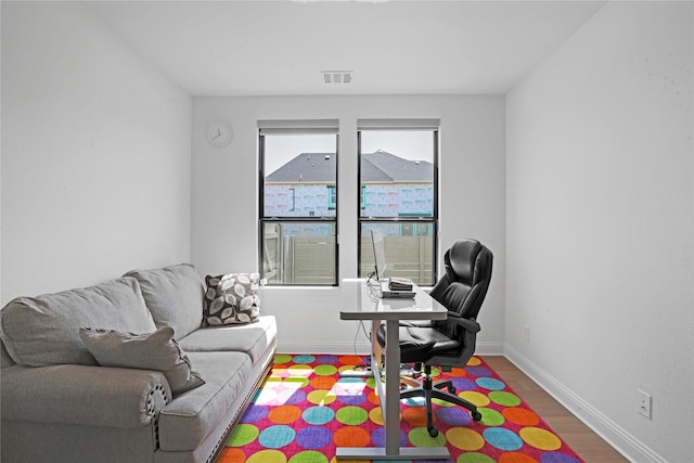 office featuring hardwood / wood-style floors