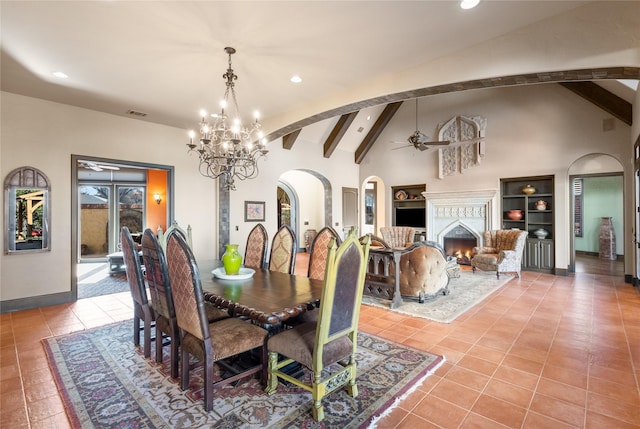 dining room with light tile patterned floors, ceiling fan with notable chandelier, and lofted ceiling with beams