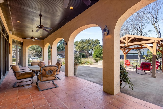 view of patio featuring a gazebo and ceiling fan