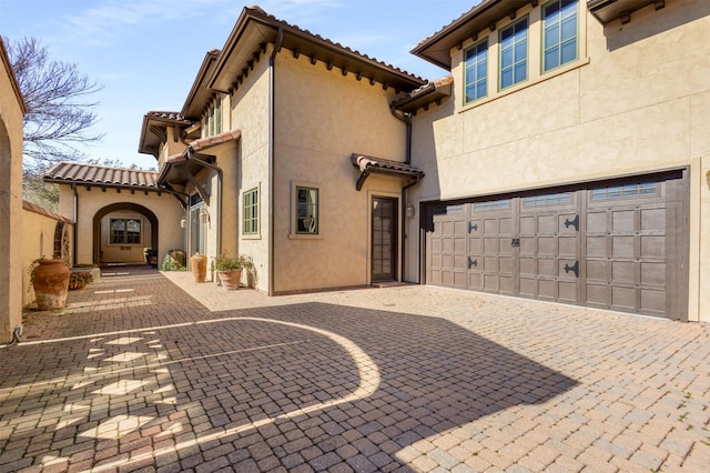 exterior space with a garage