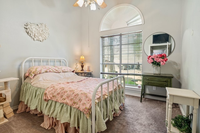 carpeted bedroom with a ceiling fan