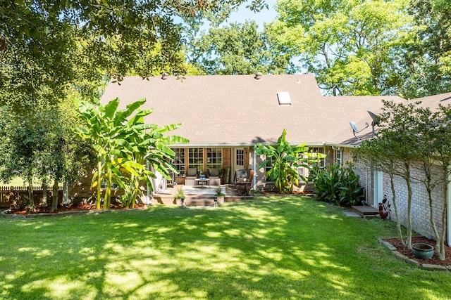 view of yard featuring fence and a wooden deck