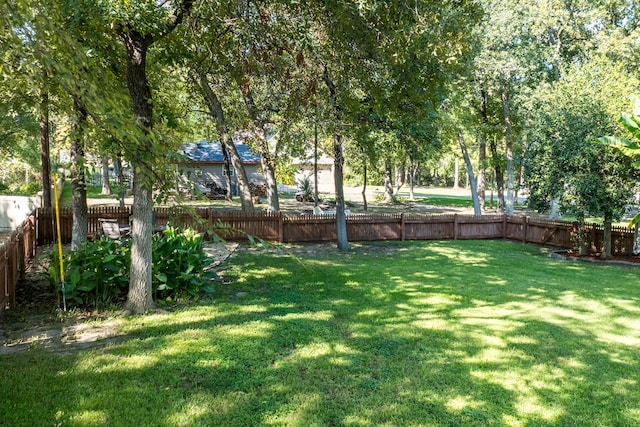 view of yard featuring a fenced backyard